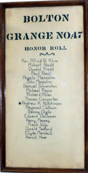<b>Figure 4.</b> Grange Honor Roll Plaque listing the Grange members who served in WWII, displayed in Town Hall